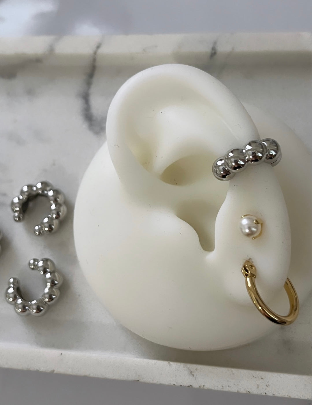 Silver bubble ear cuff